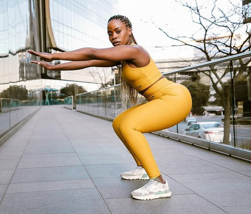 Young African woman gymnast athlete training